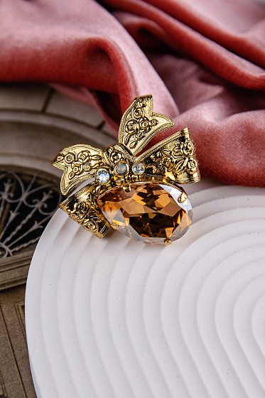 картинка Кольцо Банты (кристаллы медовые, 4,8х4,2 см, регулируется) Италия  Claudio Canzian 002 01 134 ювелирный  магазин Калина являющийся официальным дистрибьютором в России 